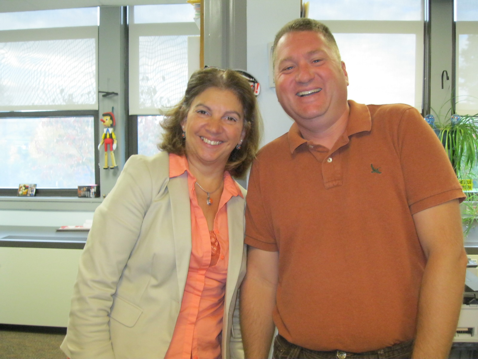 Staff wearing orange for student battling cancer.