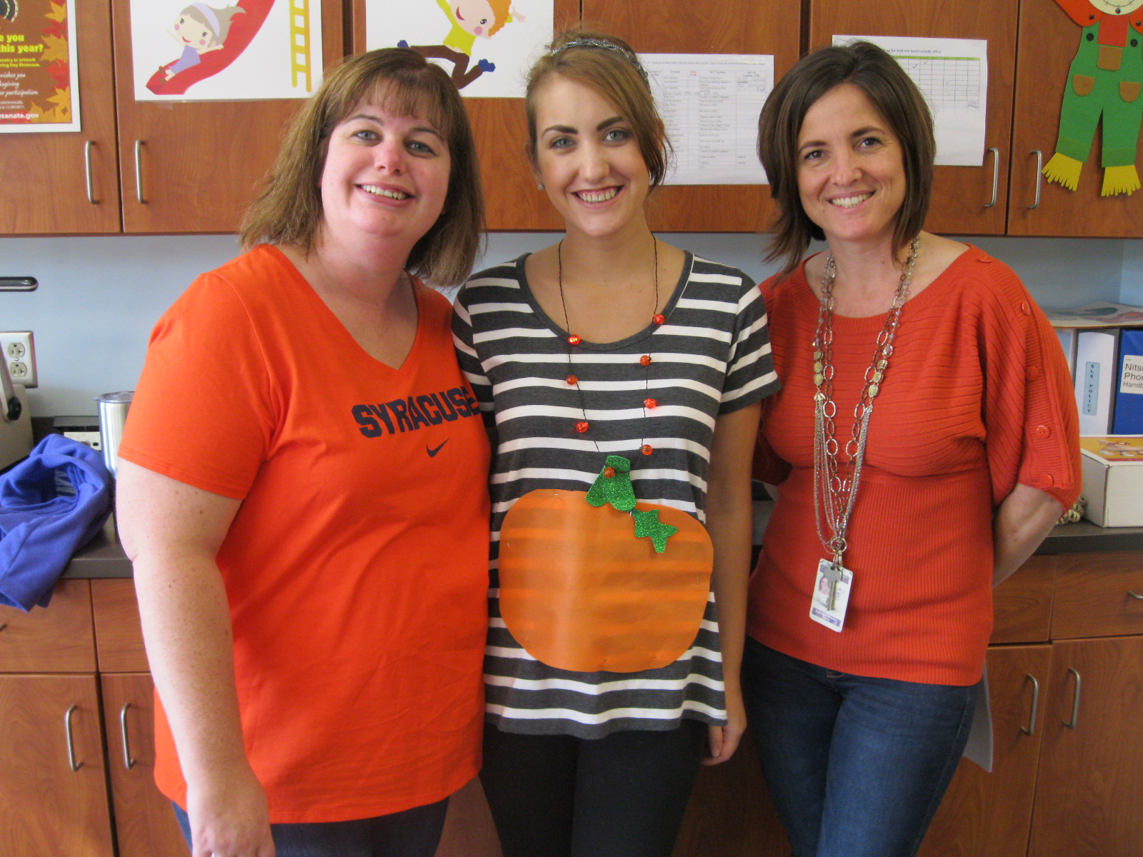 Staff wearing orange for student battling cancer.