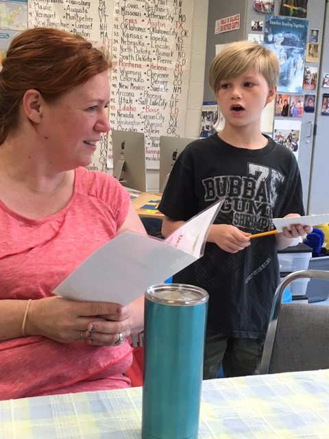 Greenlawn student asks for an order from a Teacher guest at the Cafe.