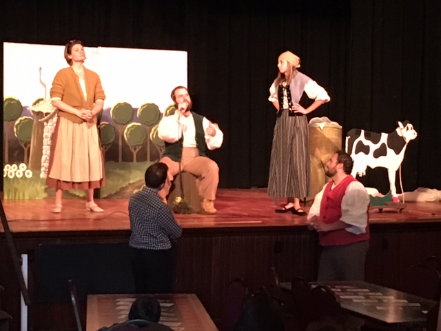 Opera actors on stage at the Tri-Town Theater