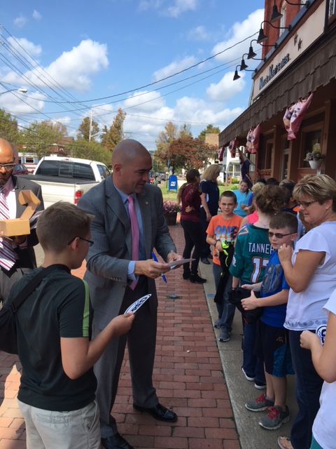 Senator Akshar greets students outside the Tri-Town Theatre