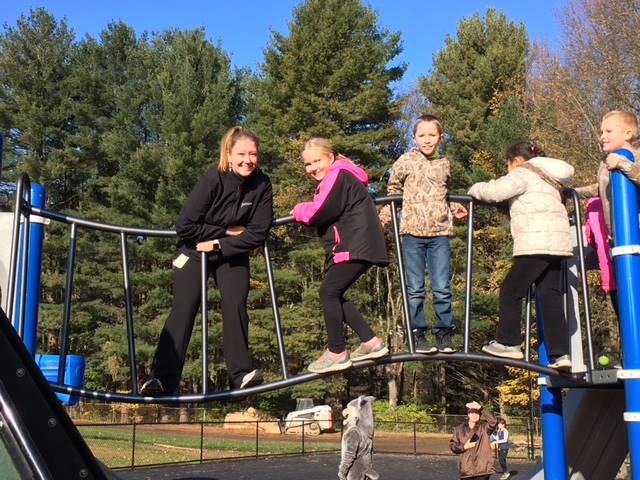 Students and teachers on the climbing apparatus