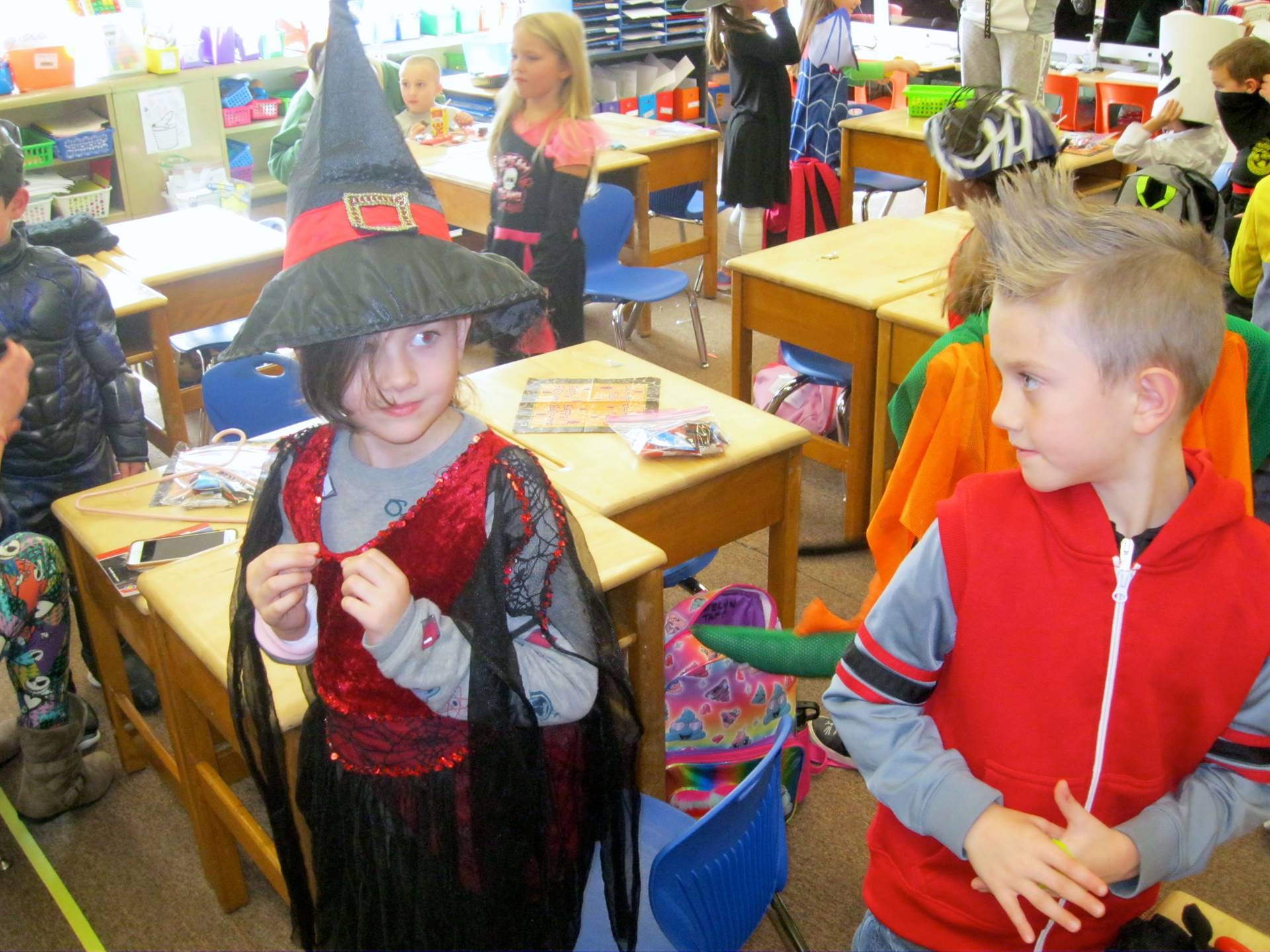 2 students in fall parade dress up