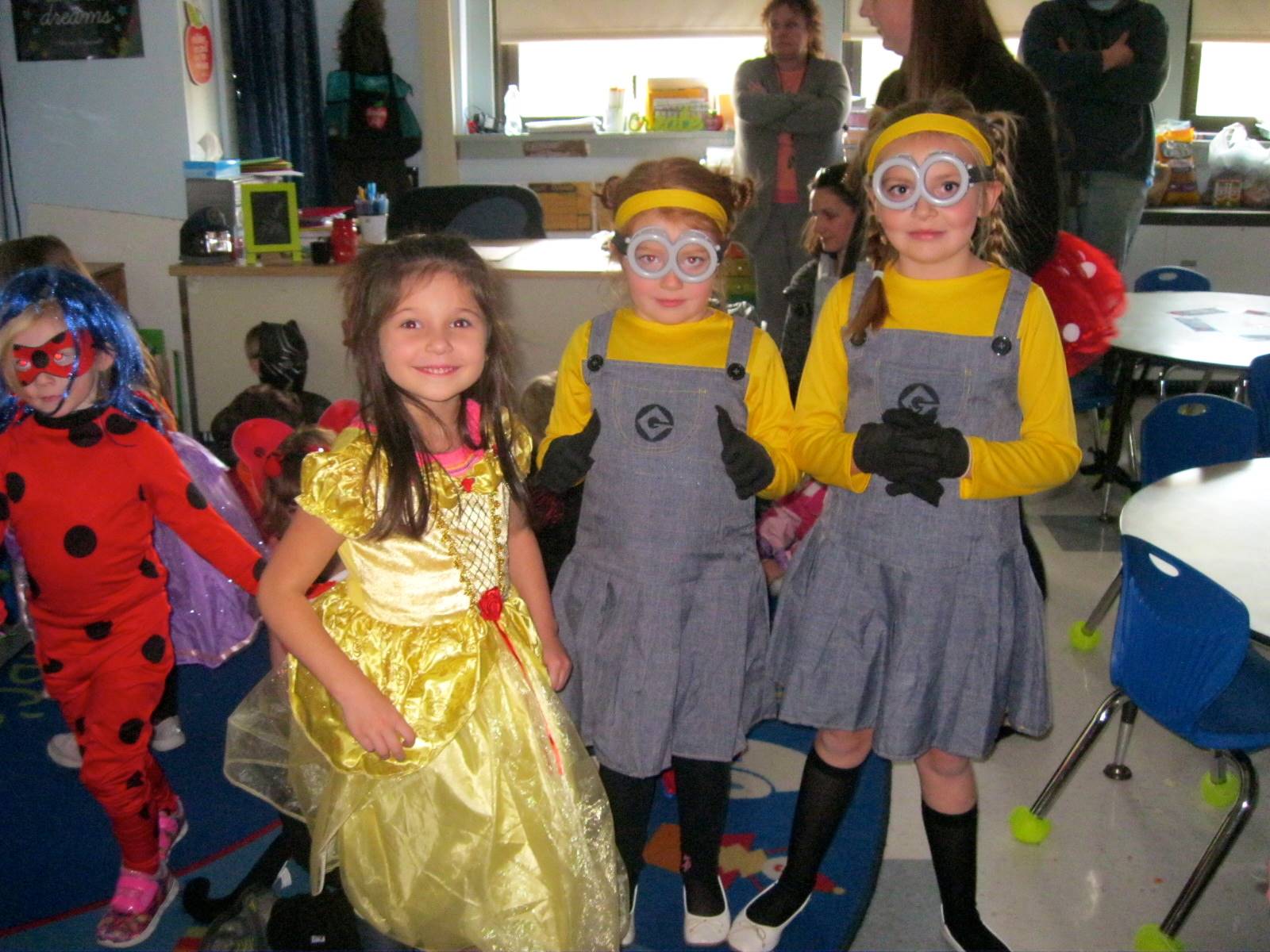 2 Minion students and Belle!