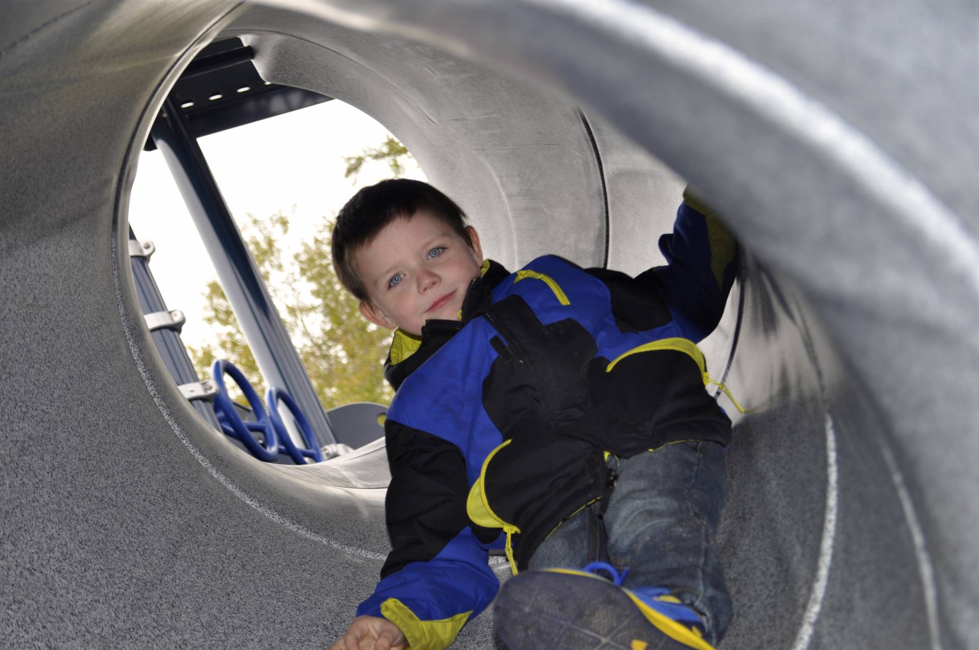 A student sliding down the tunnel.