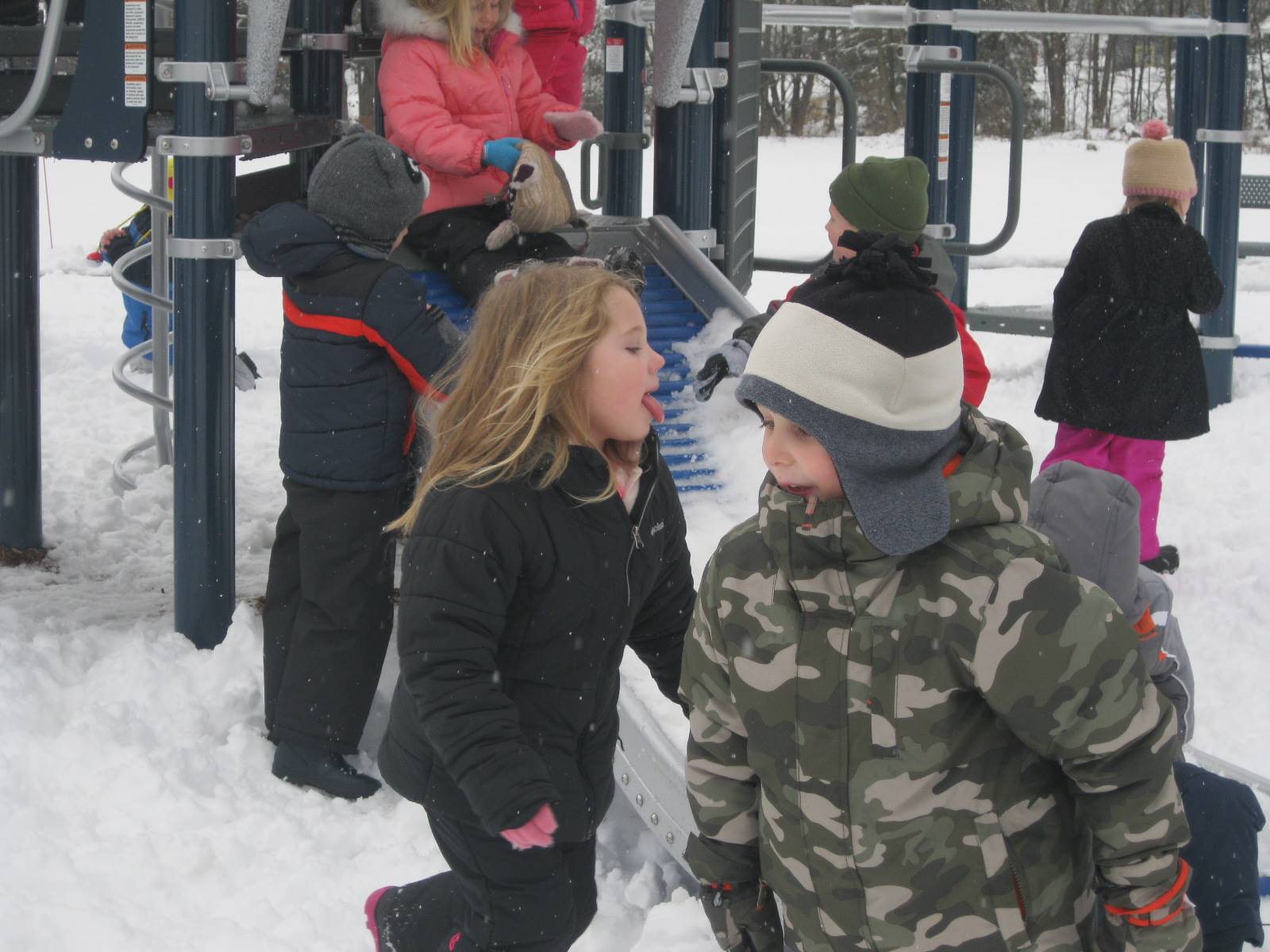 children on the snowy playground