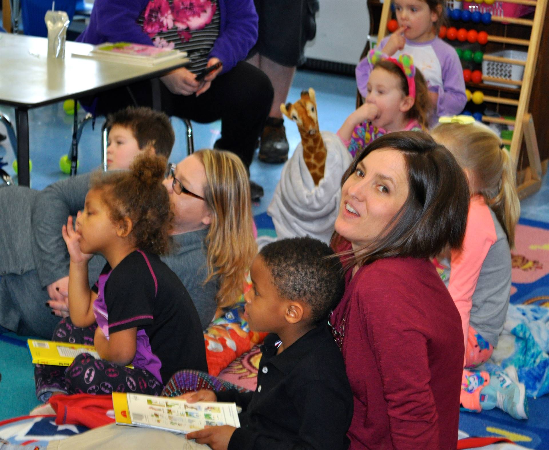 teacher with students during Read Across America Read in.