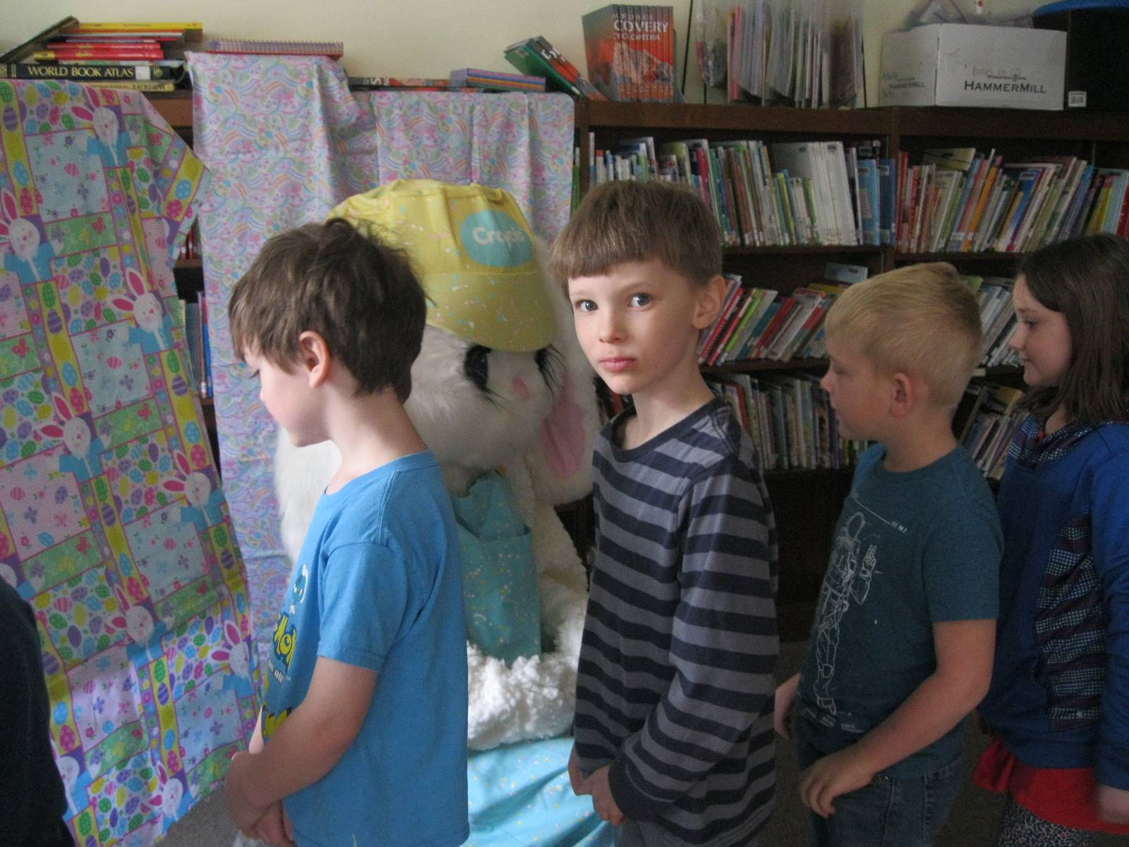 Students line up to greet the Easter Bunny.