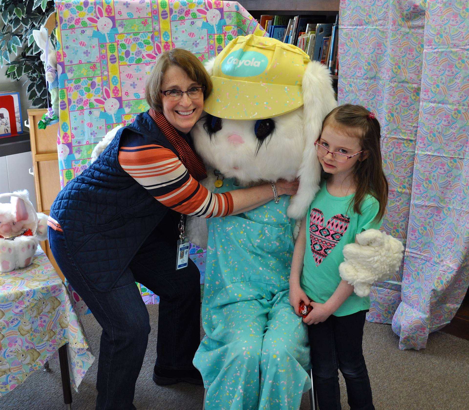 Mrs. Bianchi and student welcome Easter Bunny.