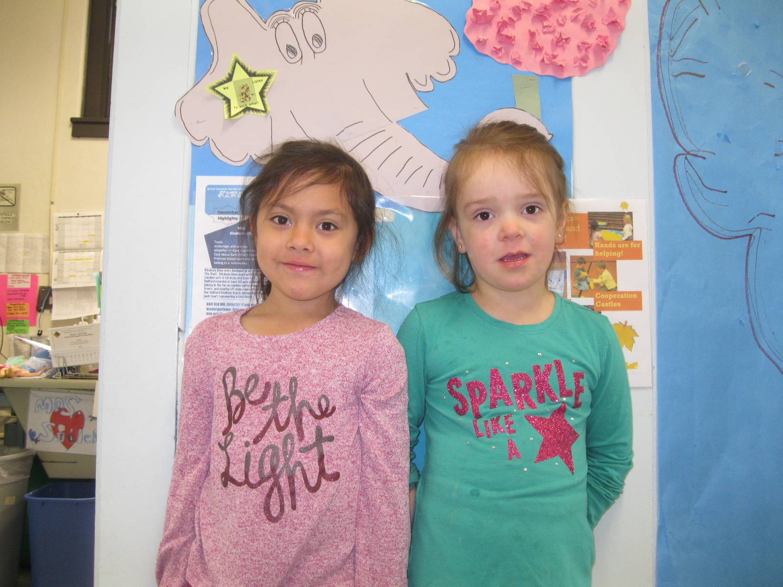 2 girls with show off shirts with positive messages!