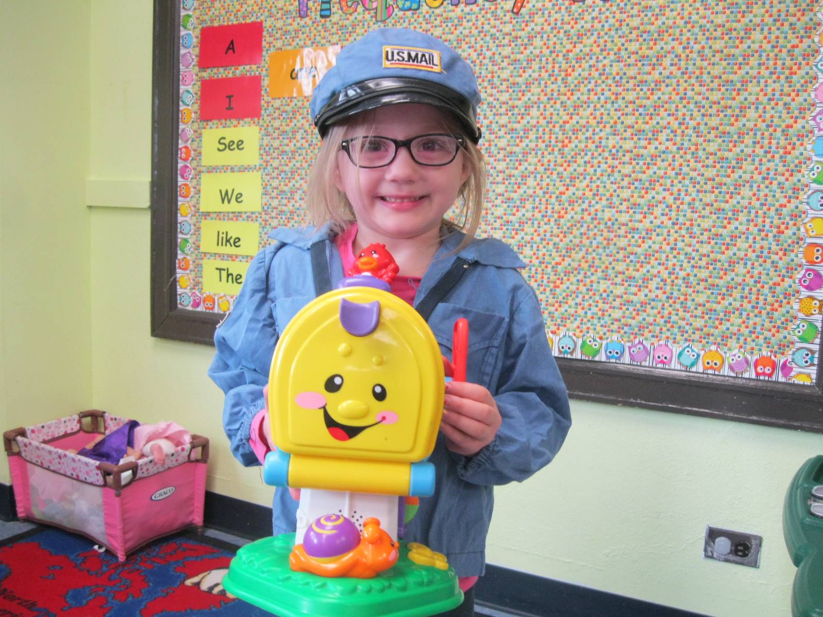 student dressed up as a mail carrier.