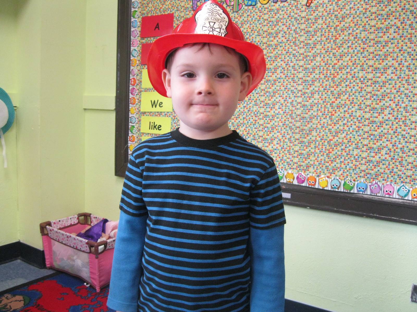student dressed up as a fire fighter.