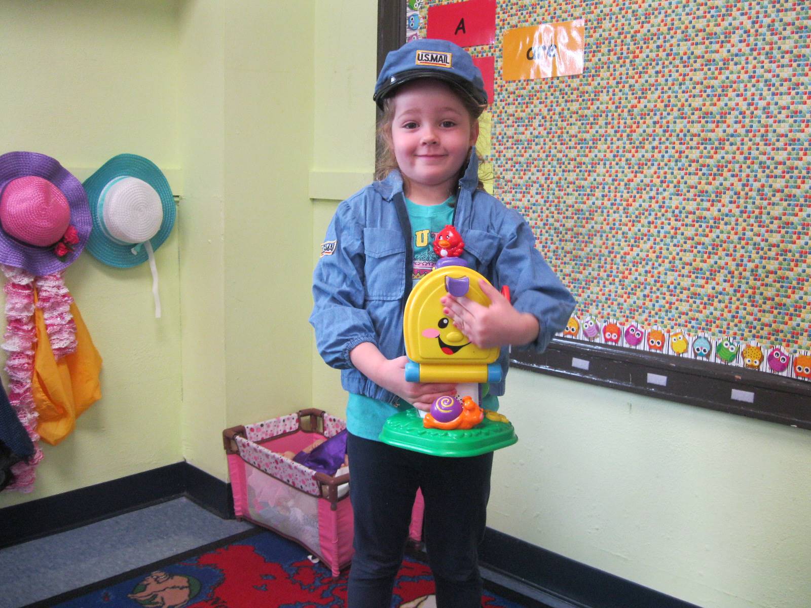 student dressed up as a mail carrier.