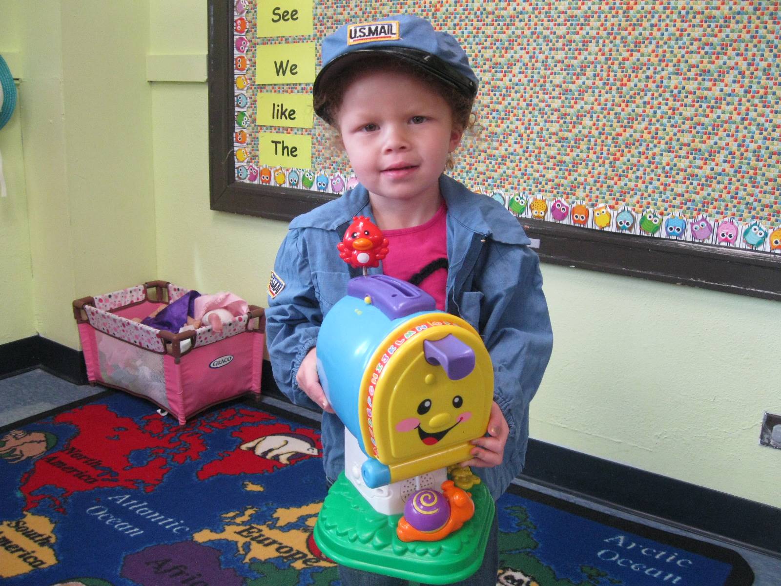 student dressed up as a mail carrier.