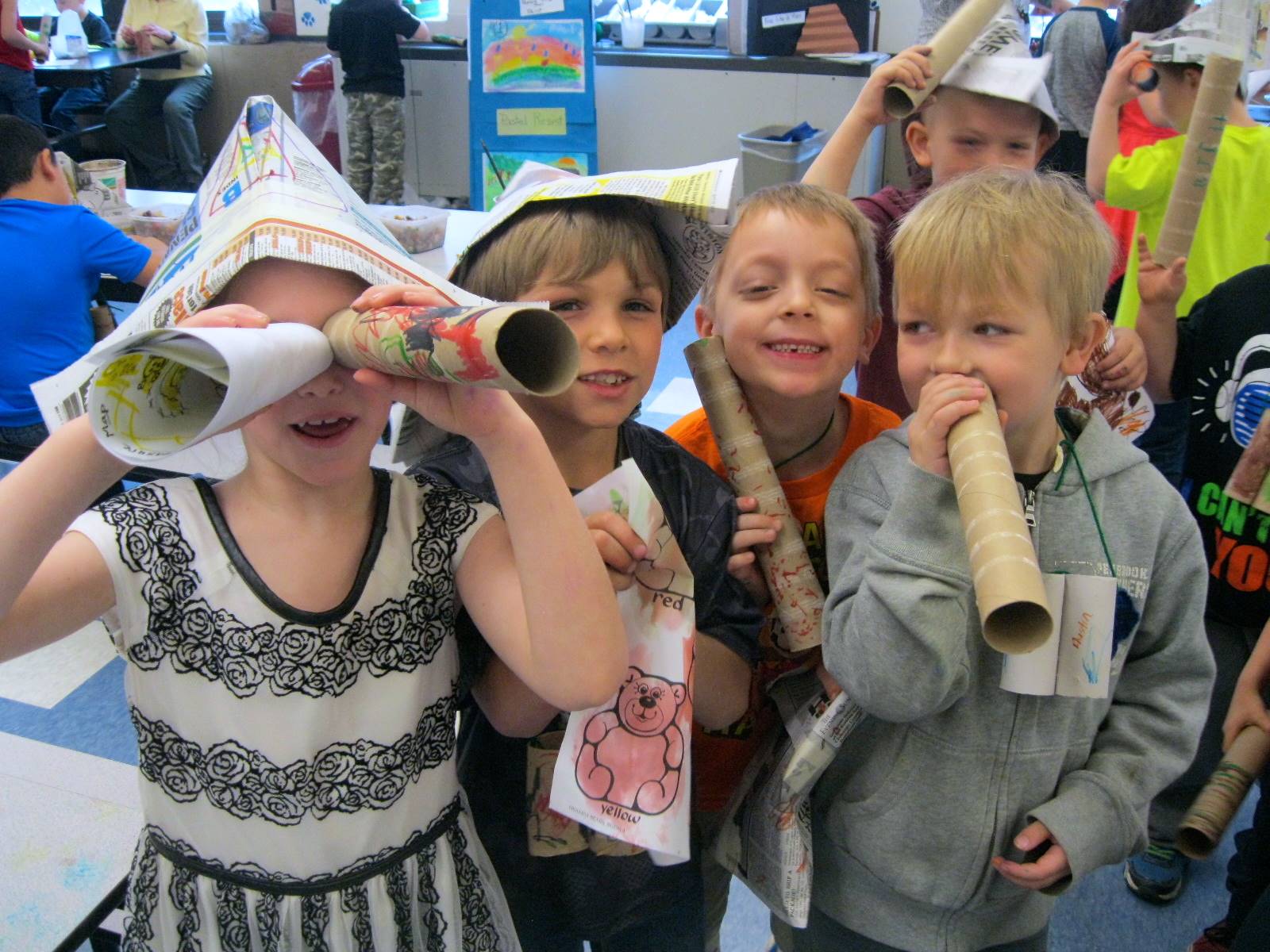 First Graders show off their Art Fair projects.