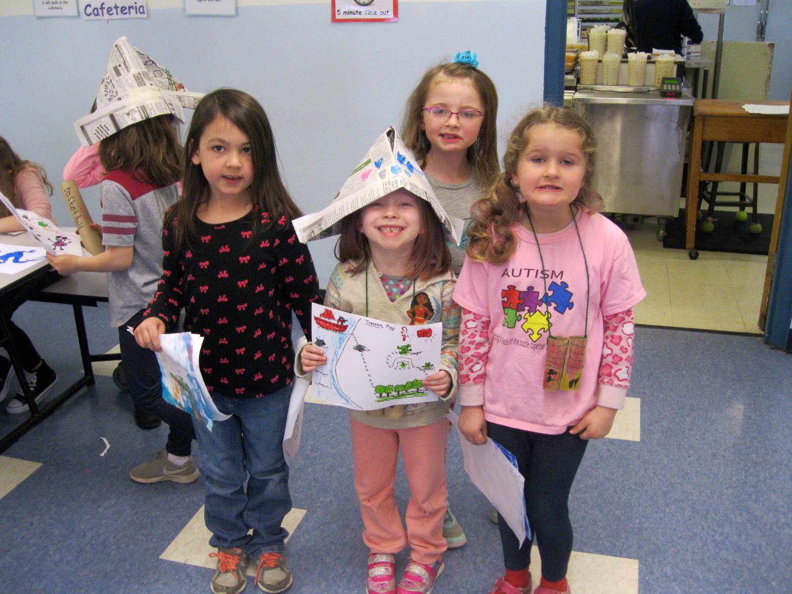 First Graders show off their Art Fair projects.