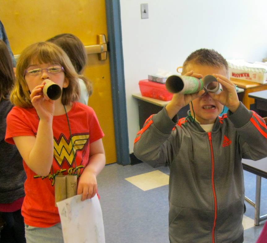 First Graders show off their Art Fair projects.