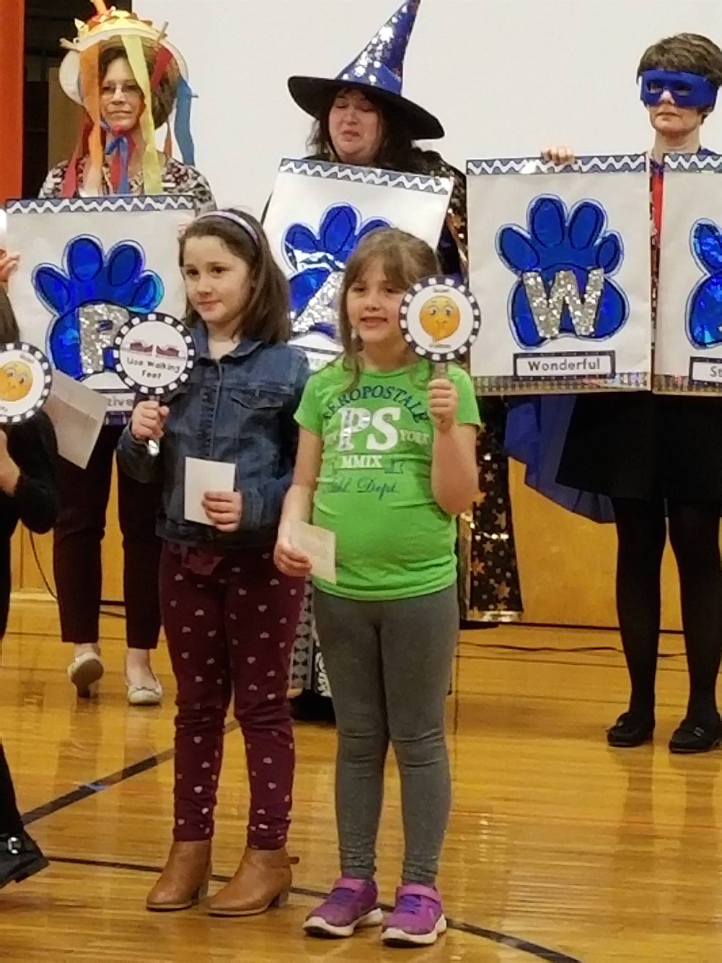 students holding signs.