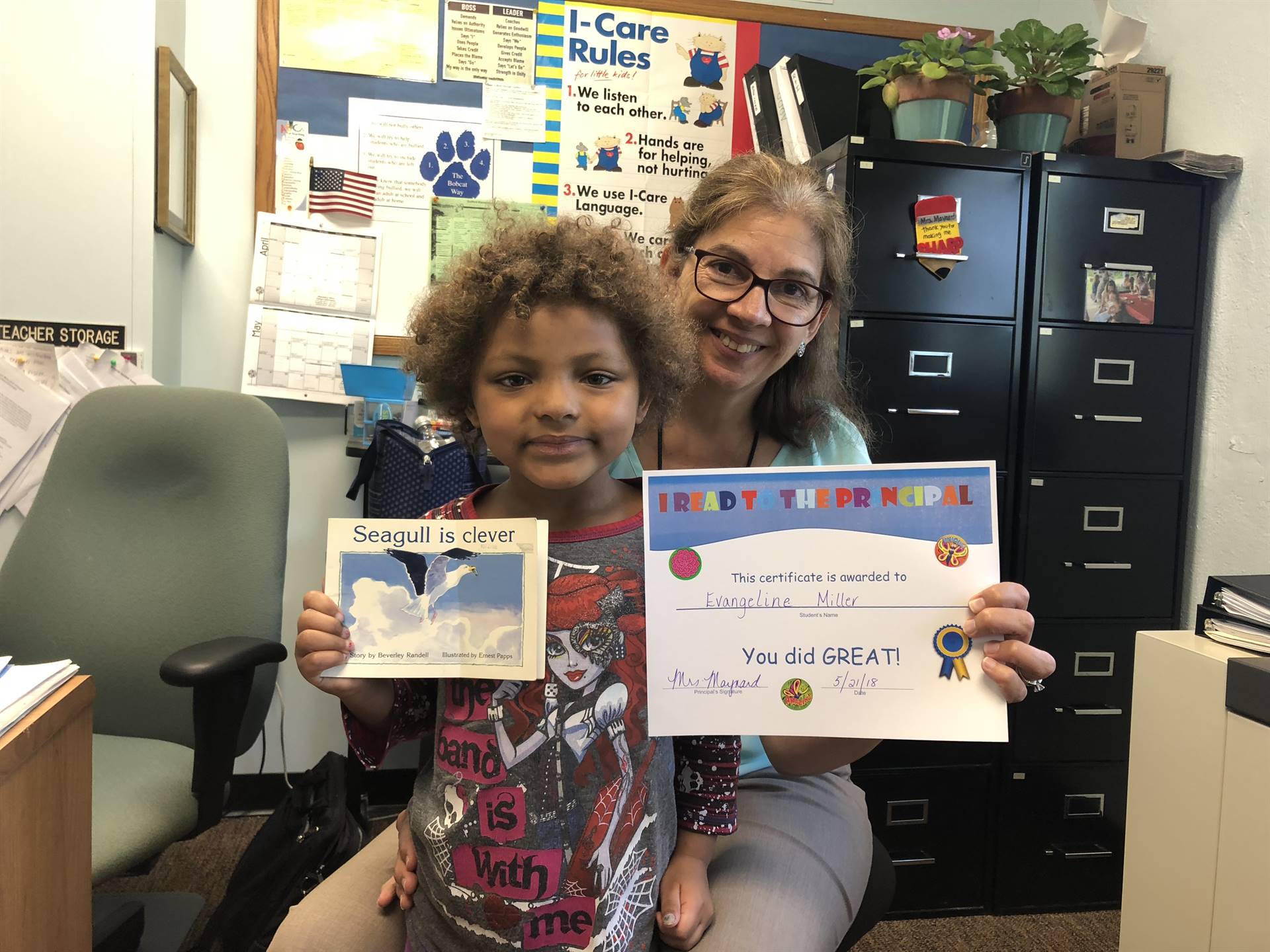 Principal and kindergartener celebrate reading!