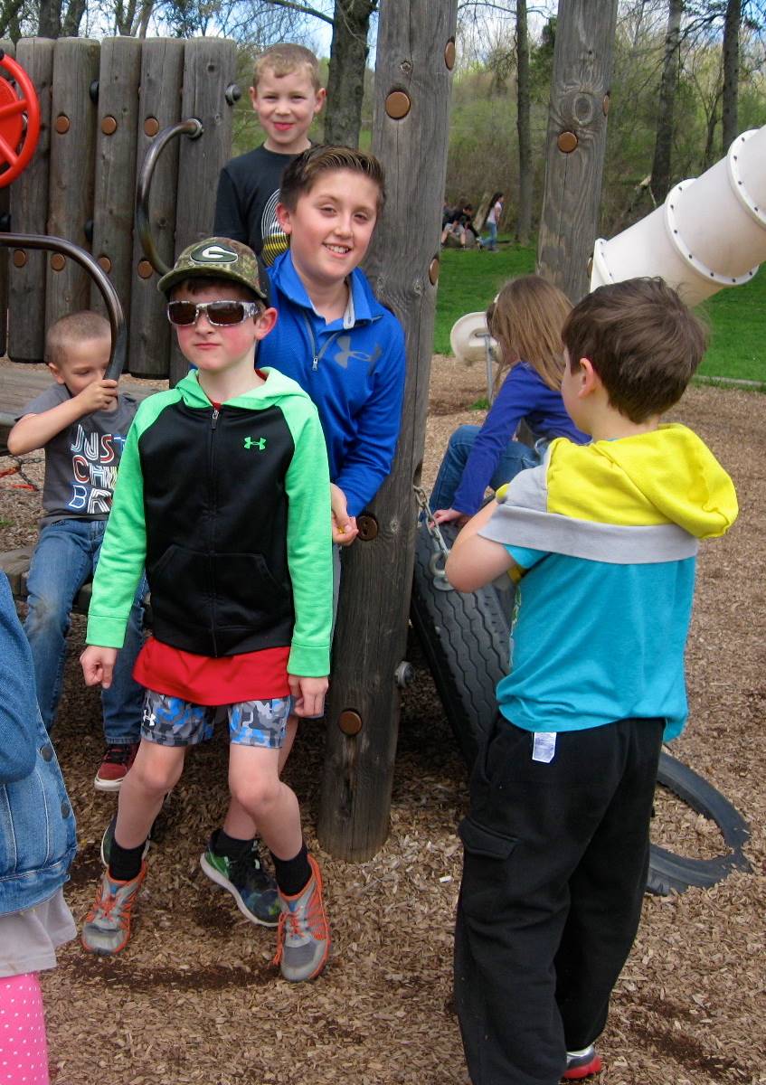 Students play on playground.