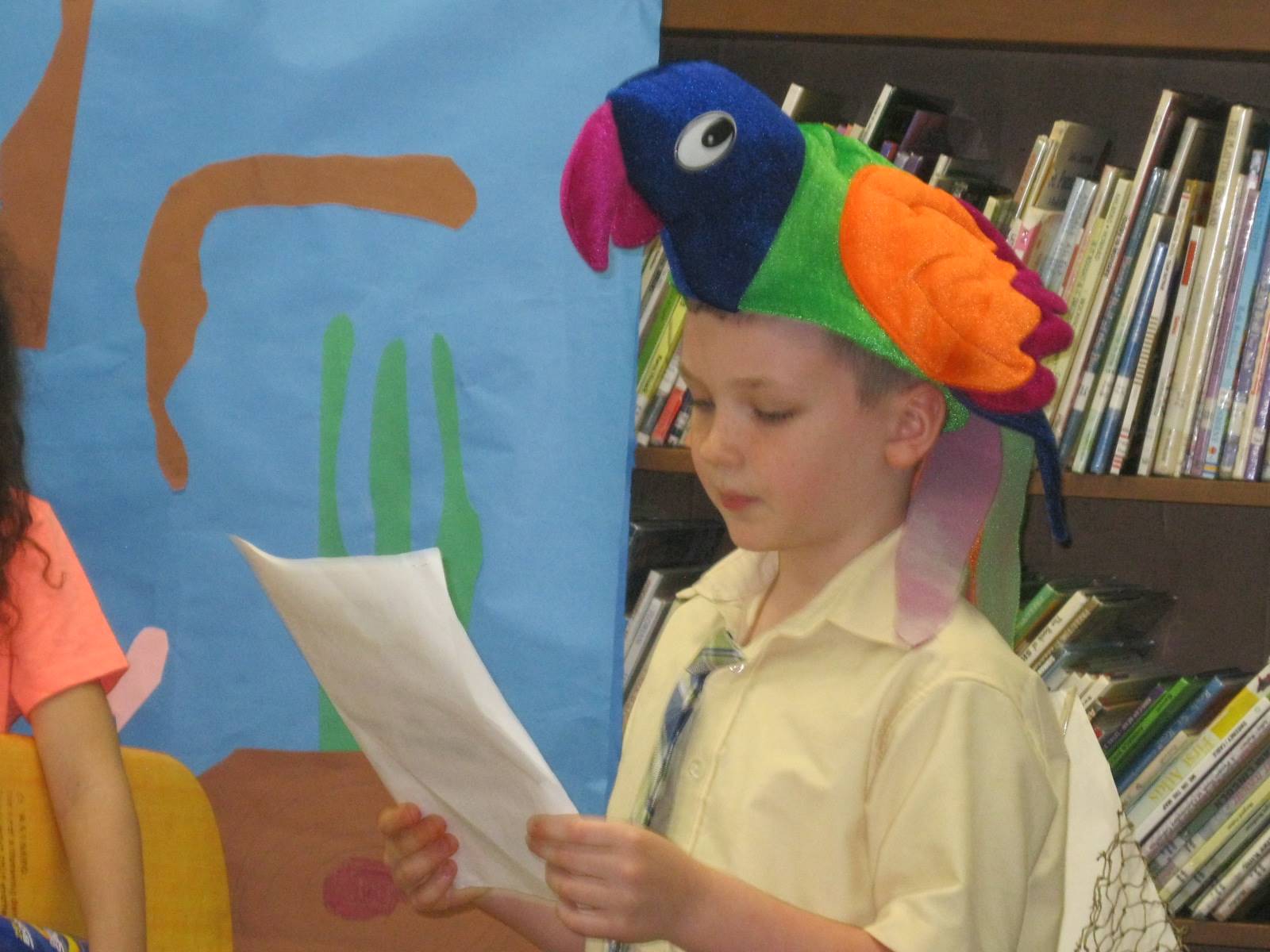 student narrates during a play.