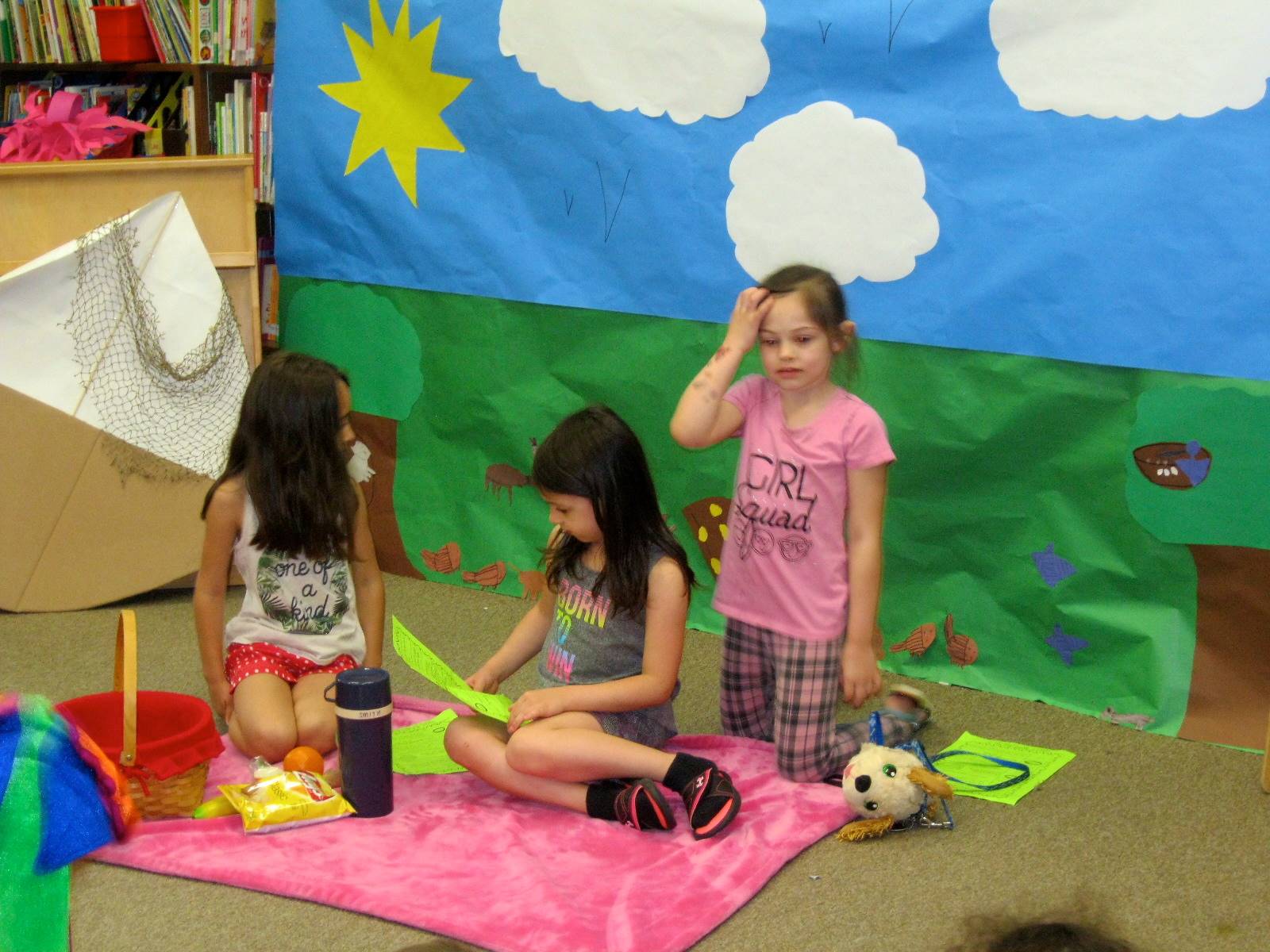 first grade students deliver a play.