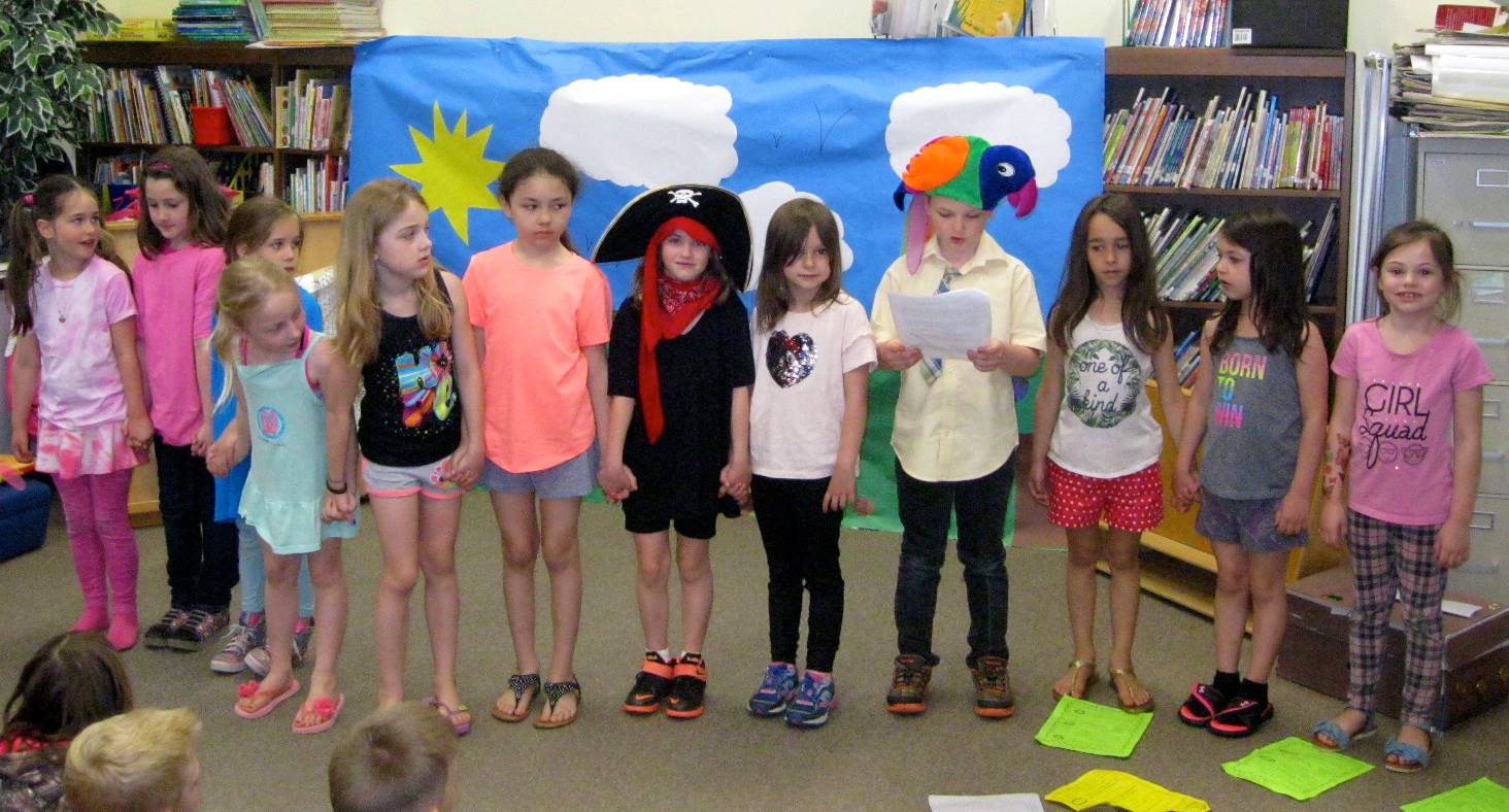 first graders who delivered a play about summer.