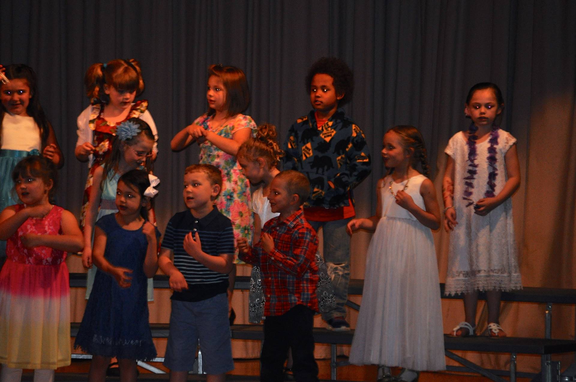 first grade students singing at 2018 spring concert
