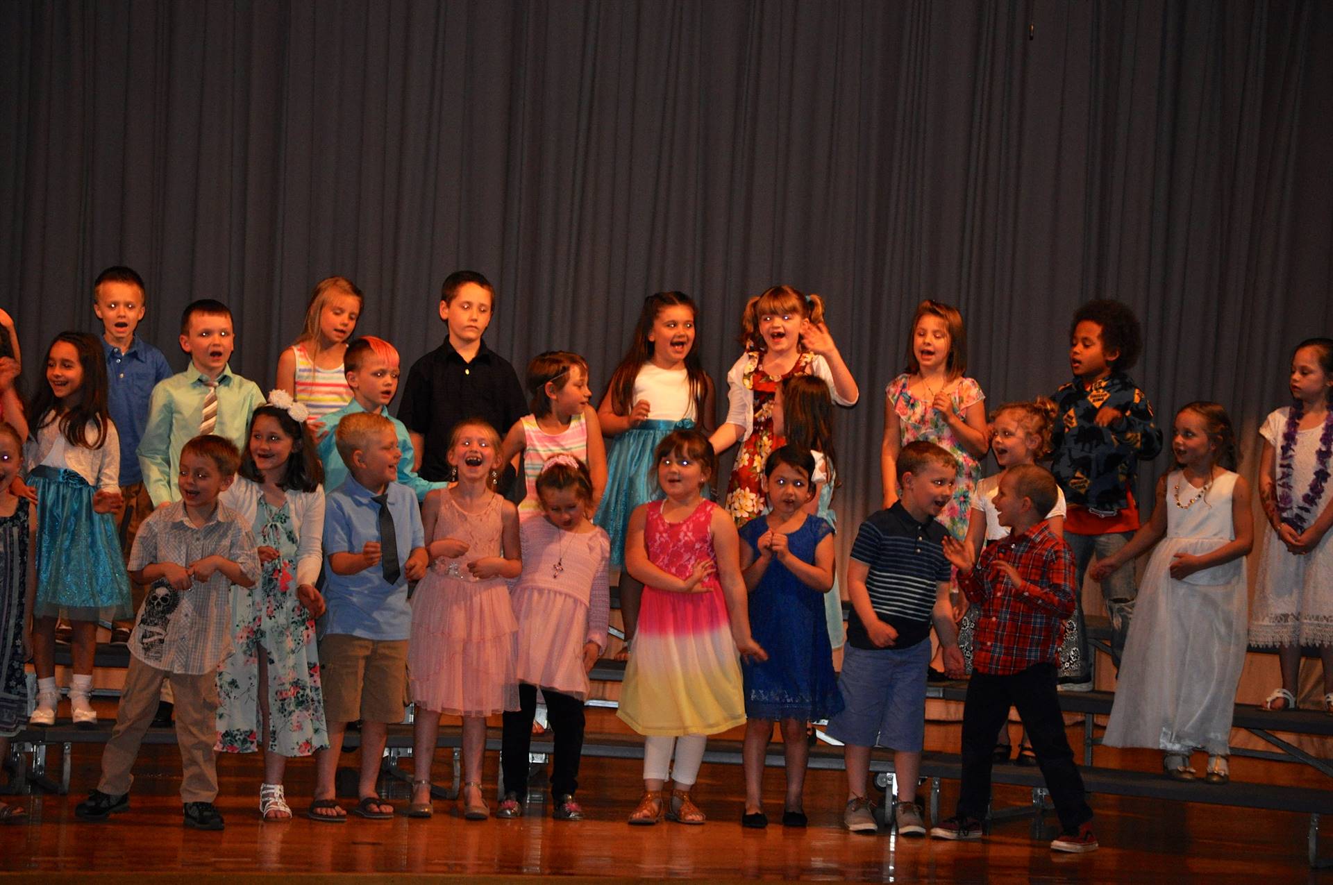 first grade students singing