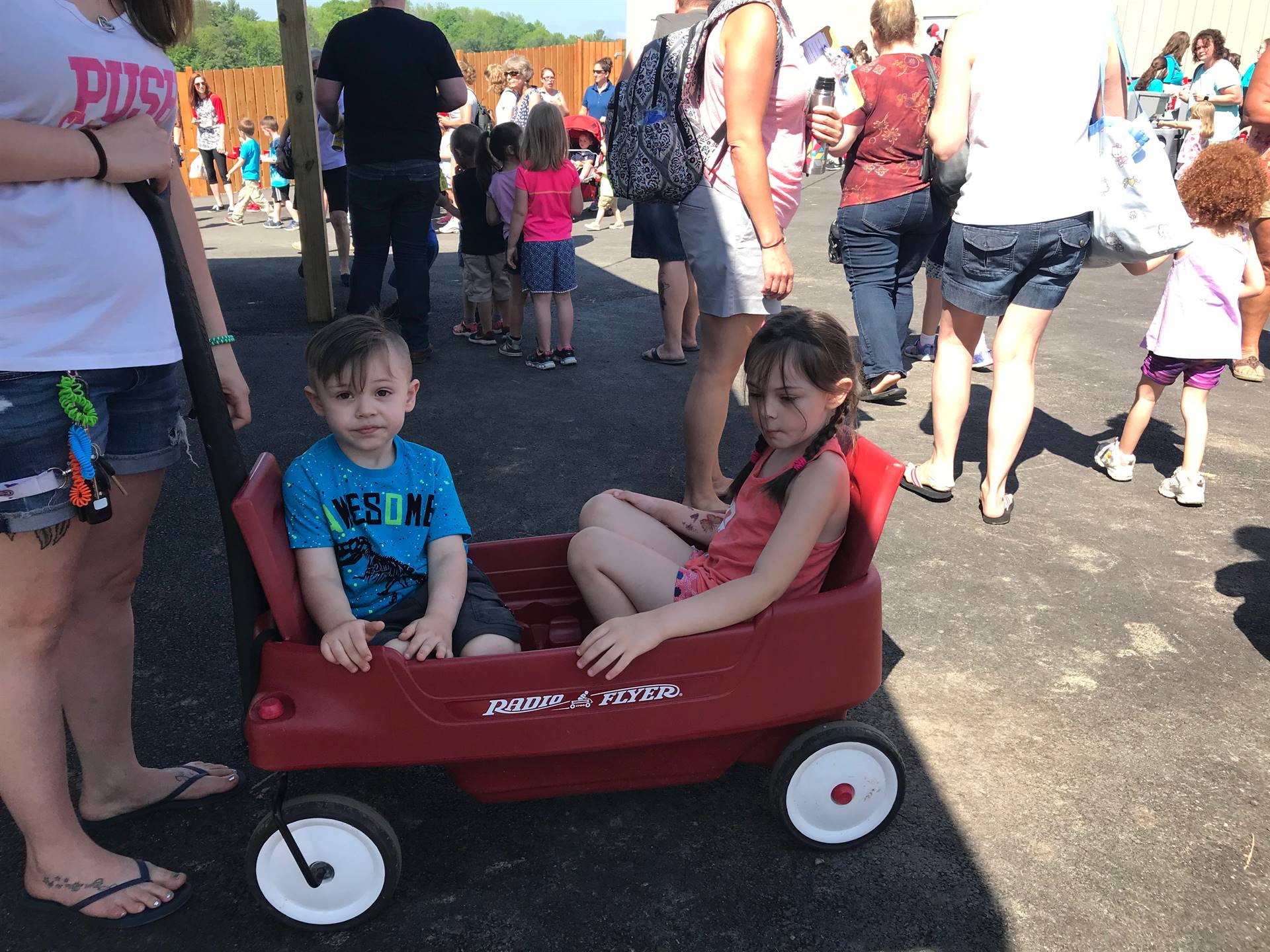 Siblings enjoy wagon ride at Animal Adventure