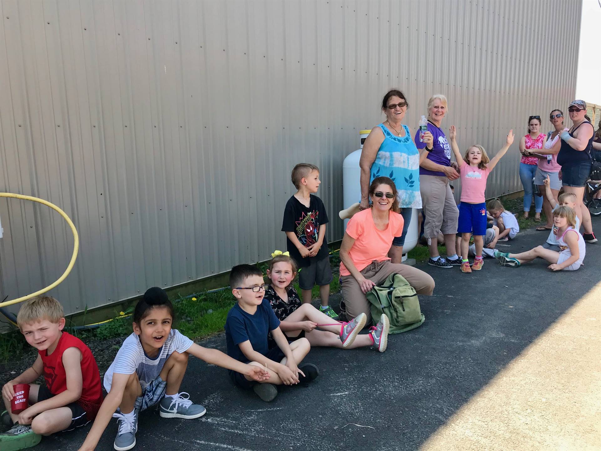 Students resting in the shade at Animal Adventure