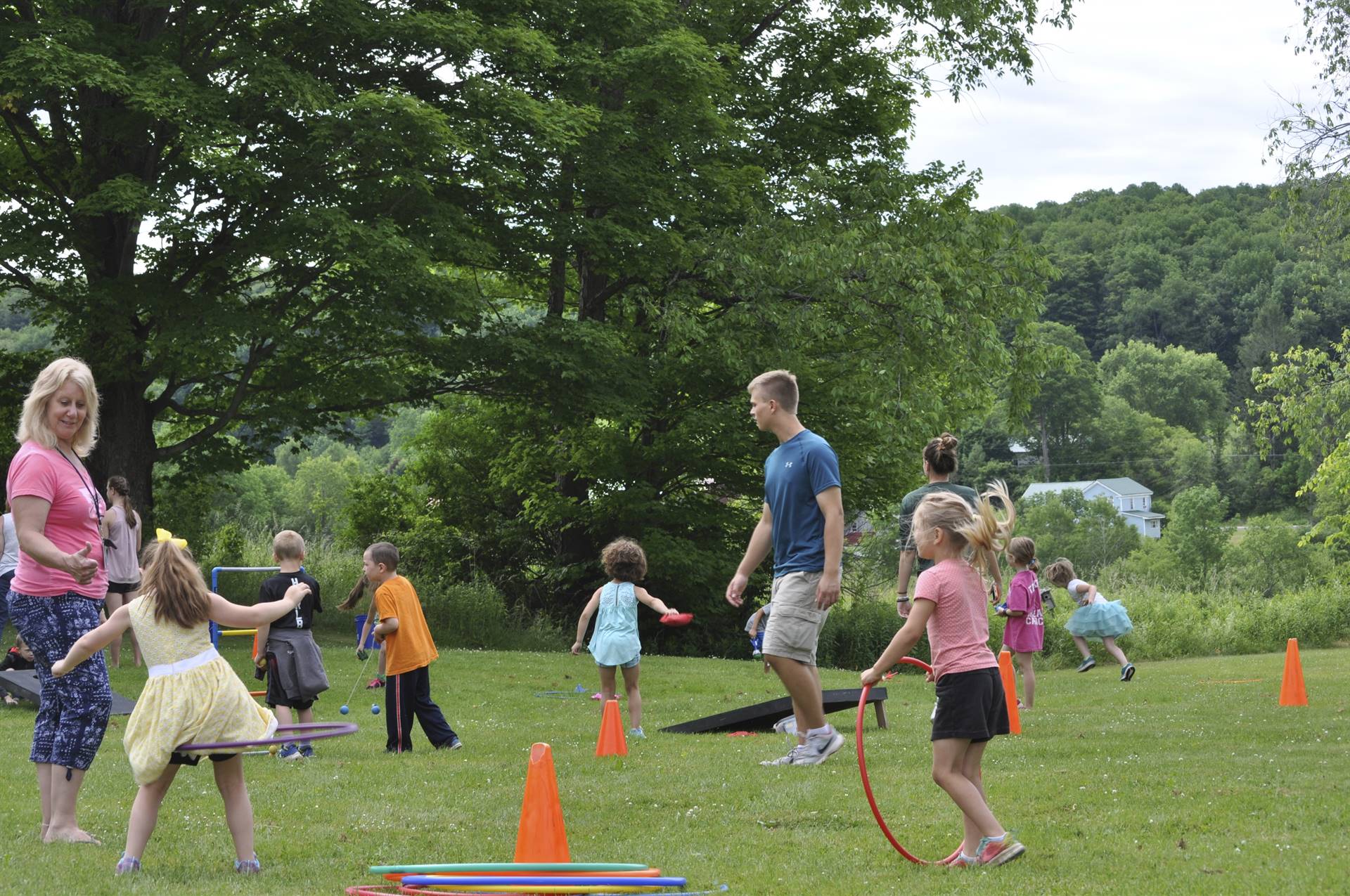 Students play outdoor games at campout.