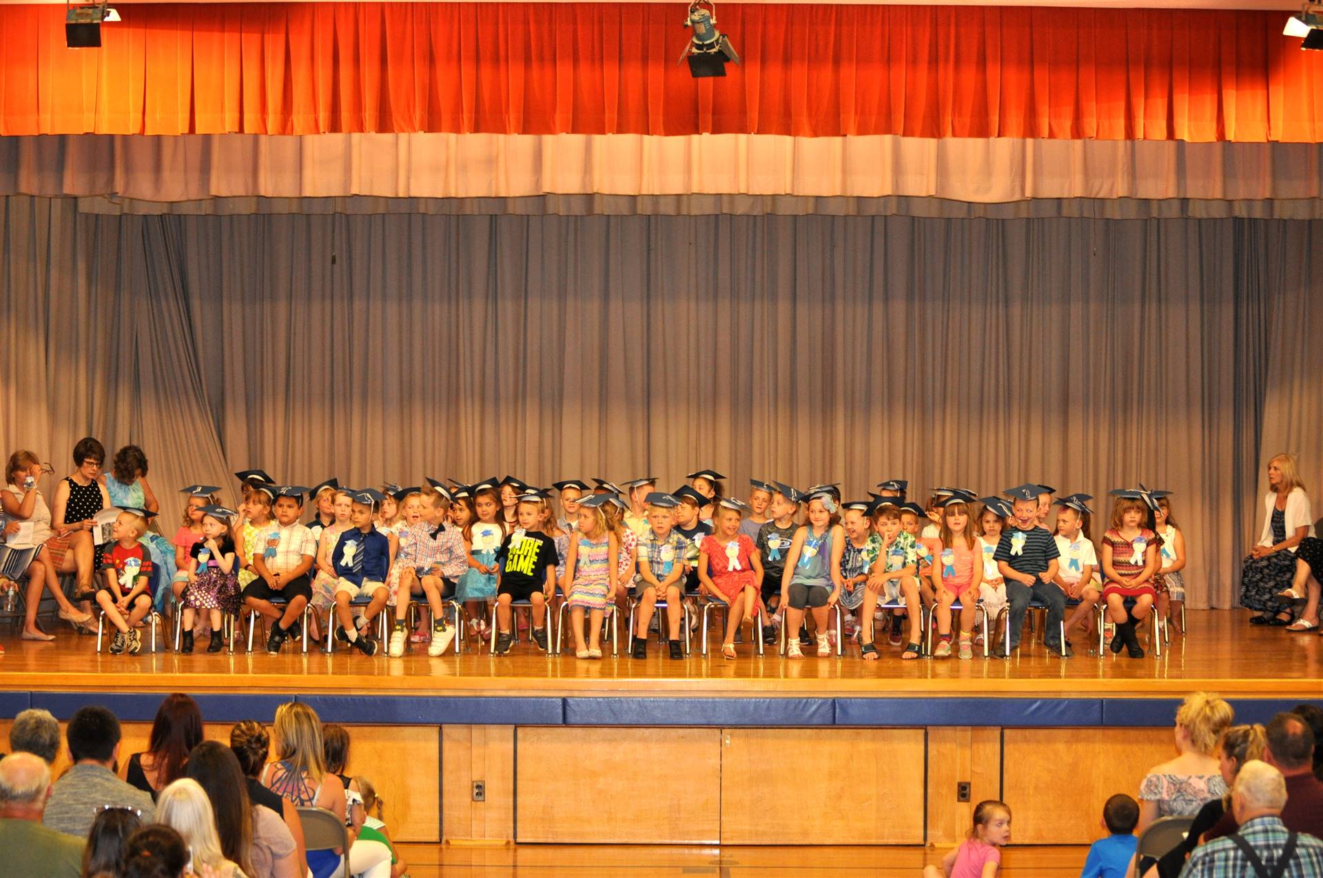 First grade graduates on stage!