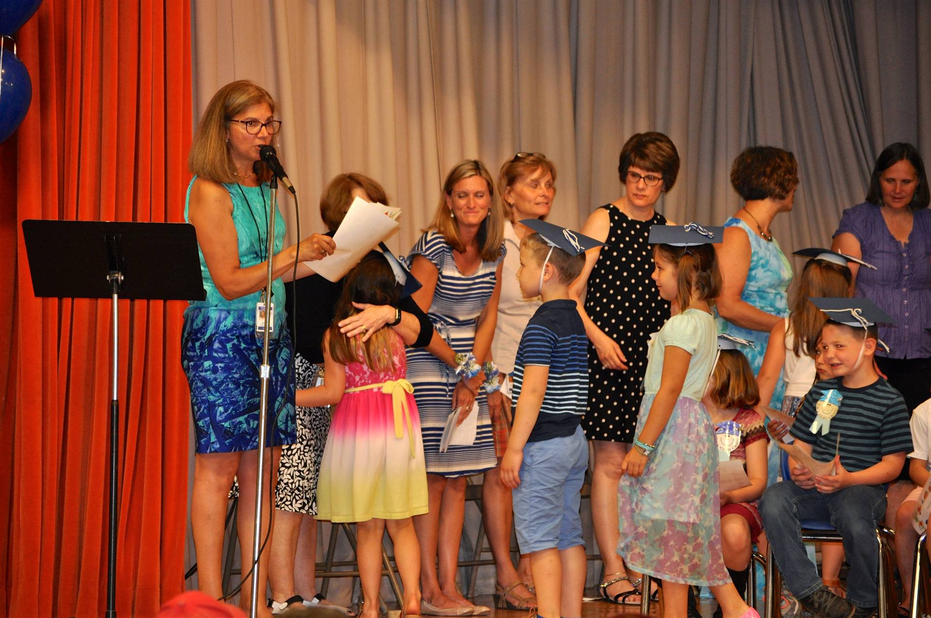First graders receive their certificates of graduation!