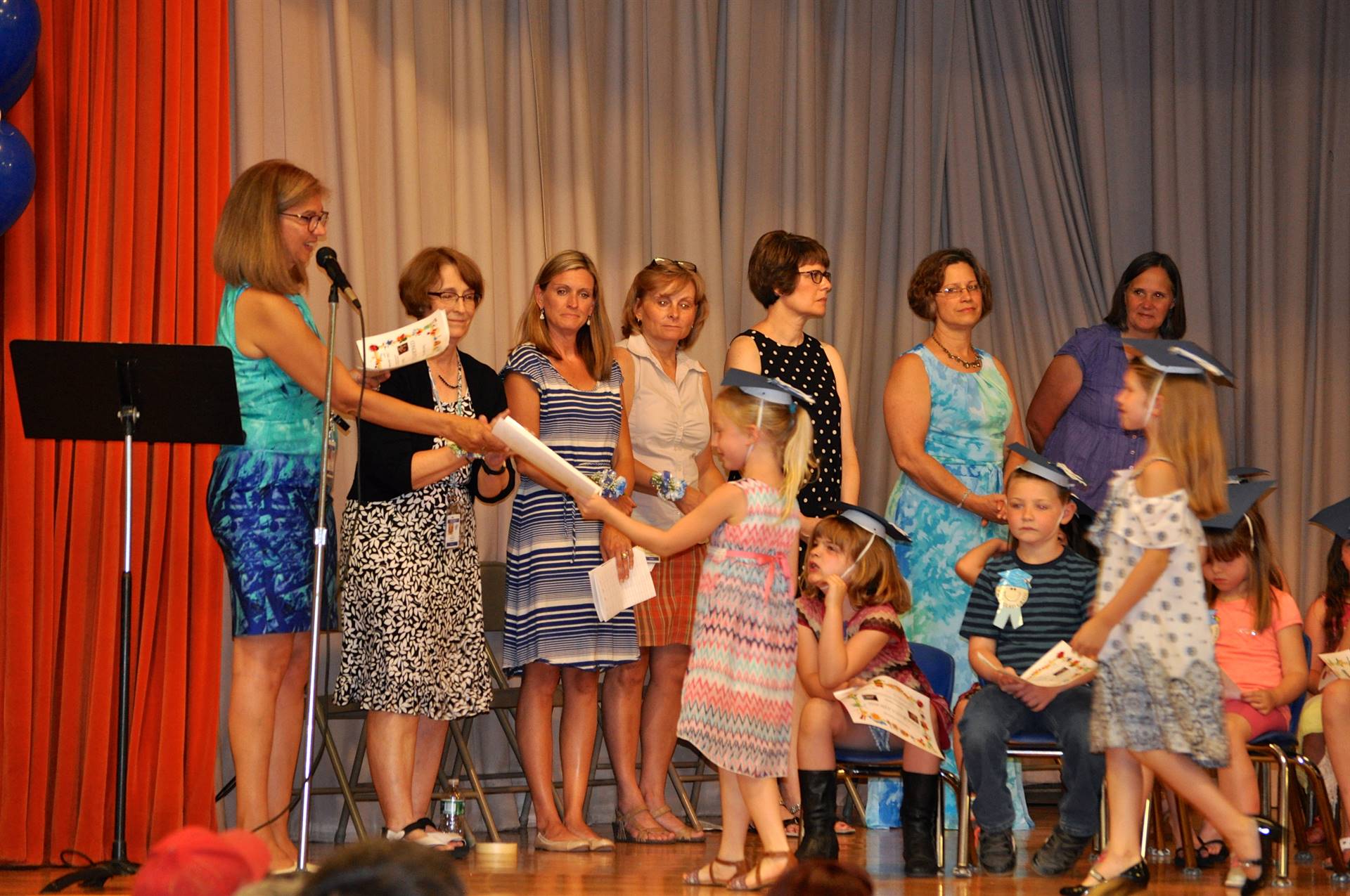 First graders receive their certificates of graduation!