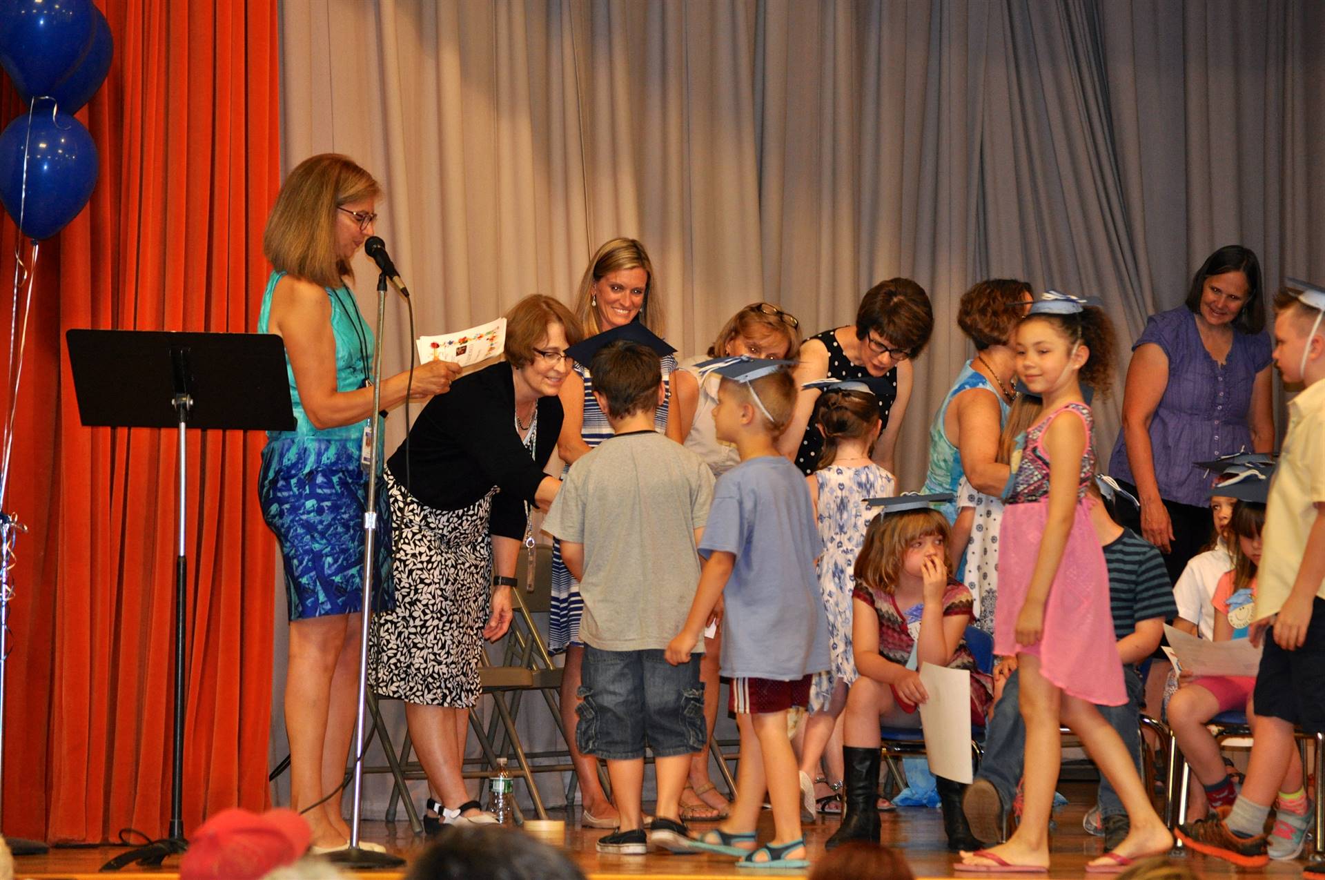 First graders receive their certificates of graduation!