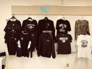 Bobcat Boutique - racks of BG shirts