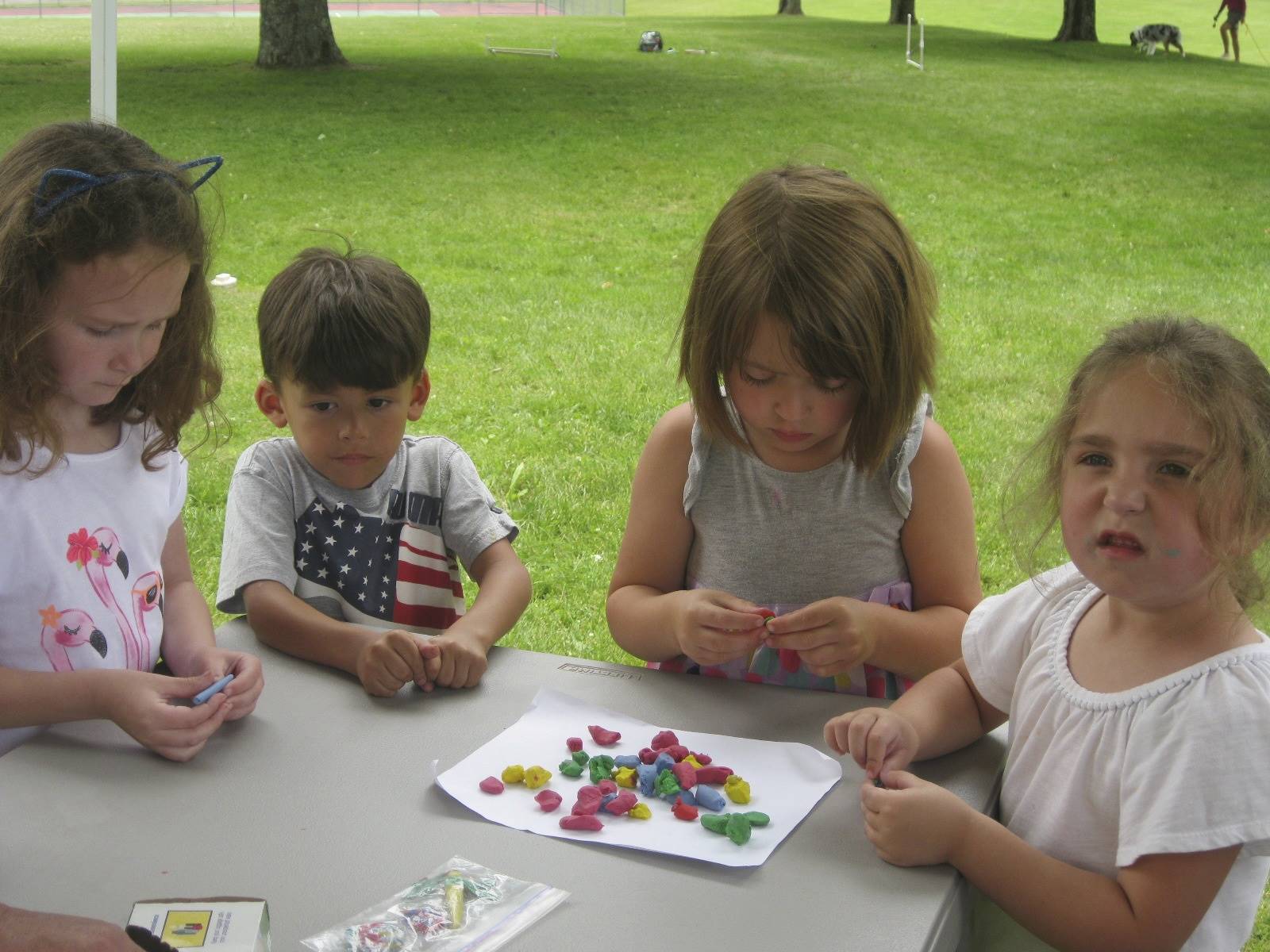 Students play with bugs.