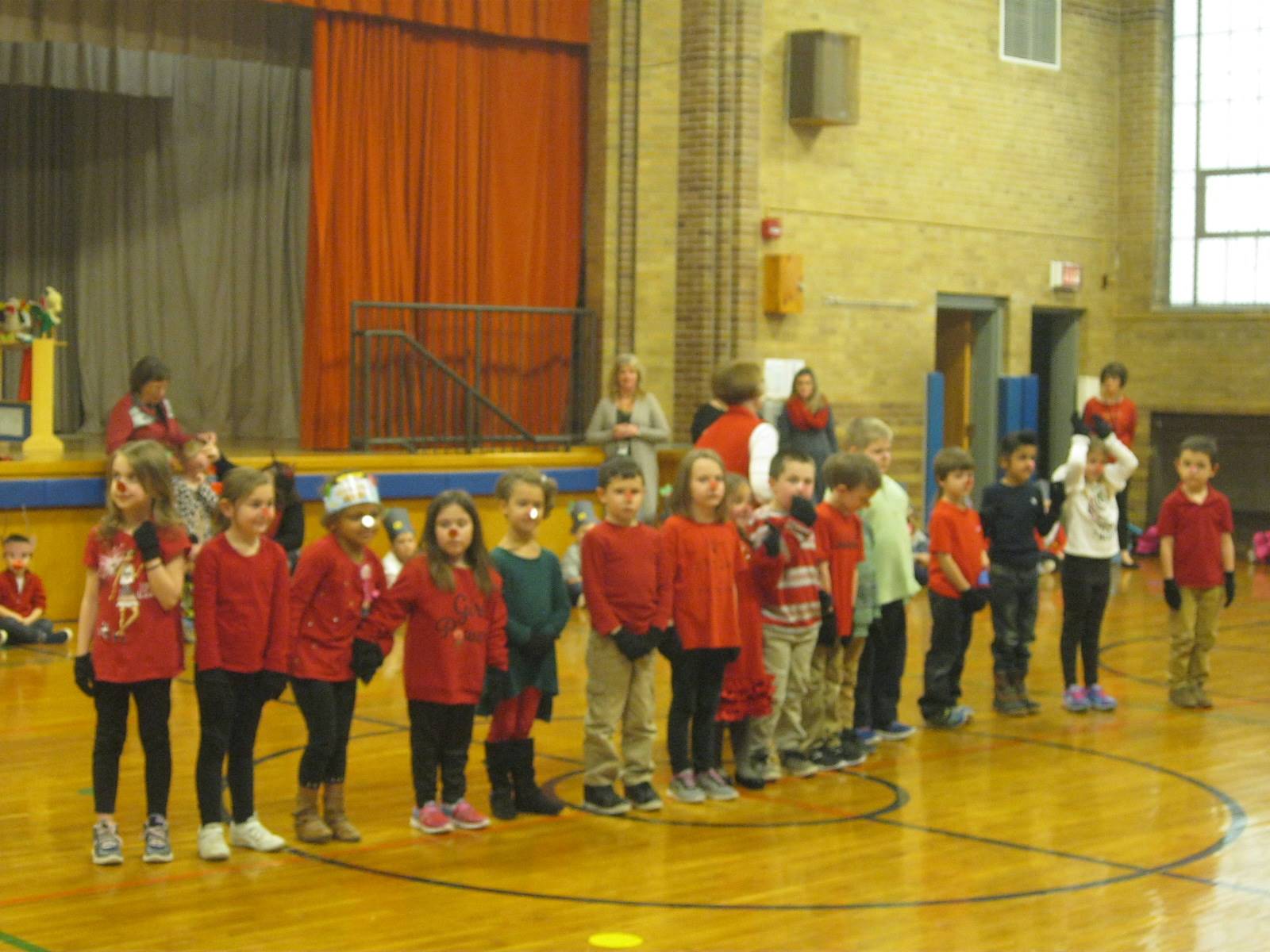 Students sing and dance the reindeer hokey pokey.