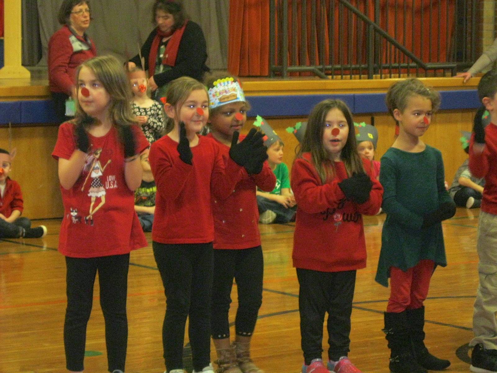 Students sing and dance the reindeer hokey pokey