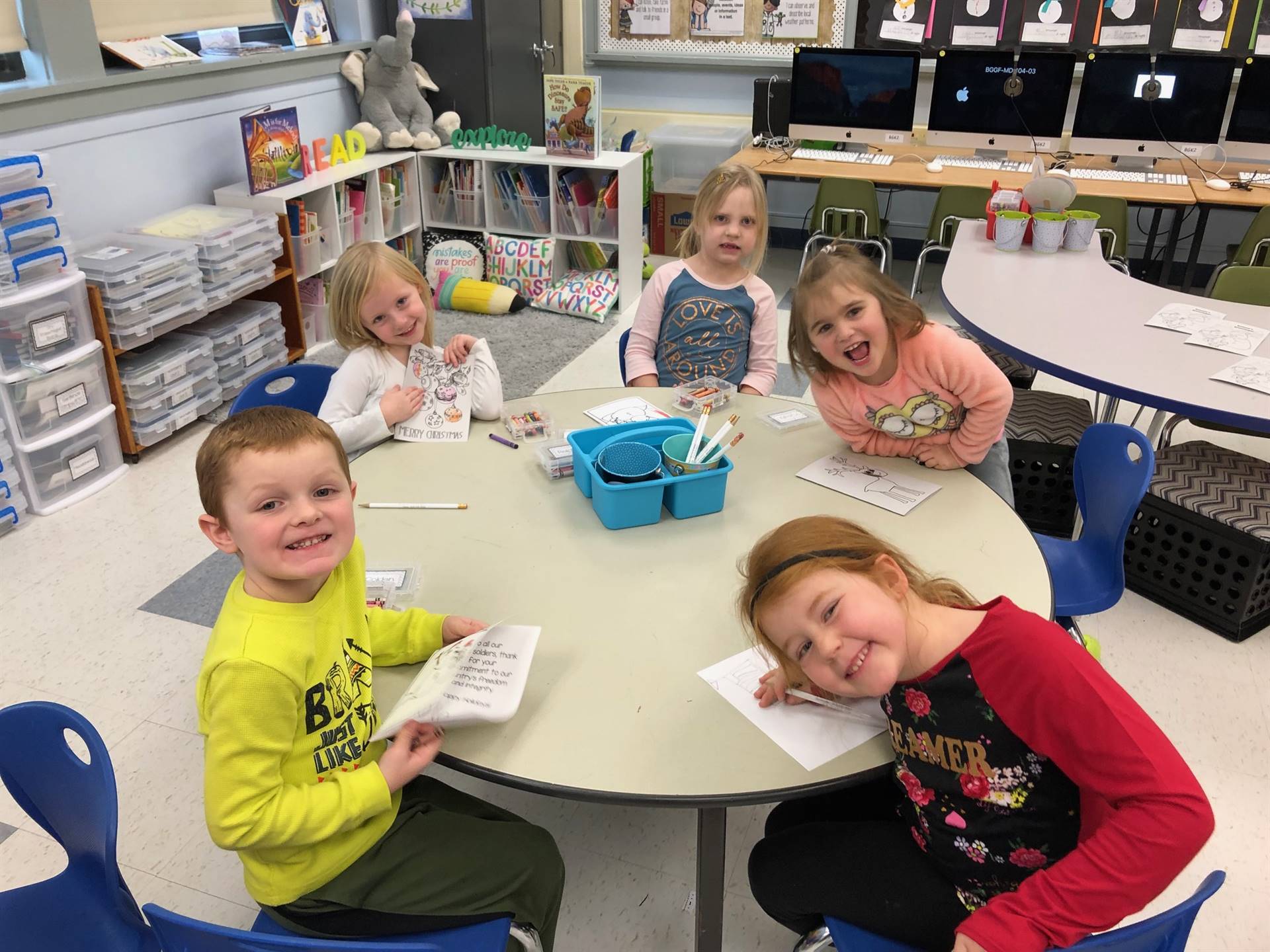 5 students at a table.