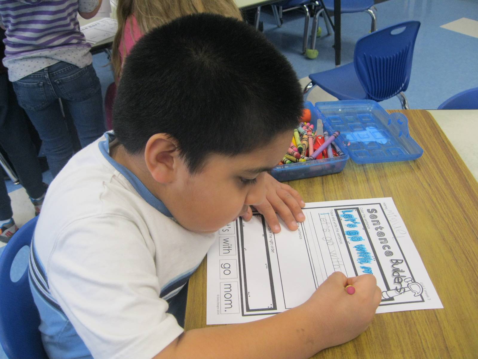 A student demonstrates a focused worker.