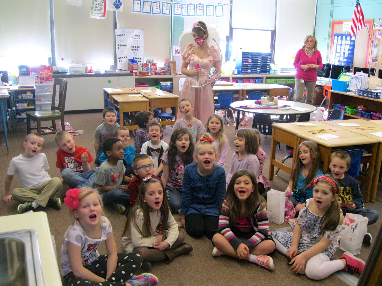 Cupid and class celebrate valentine's day.