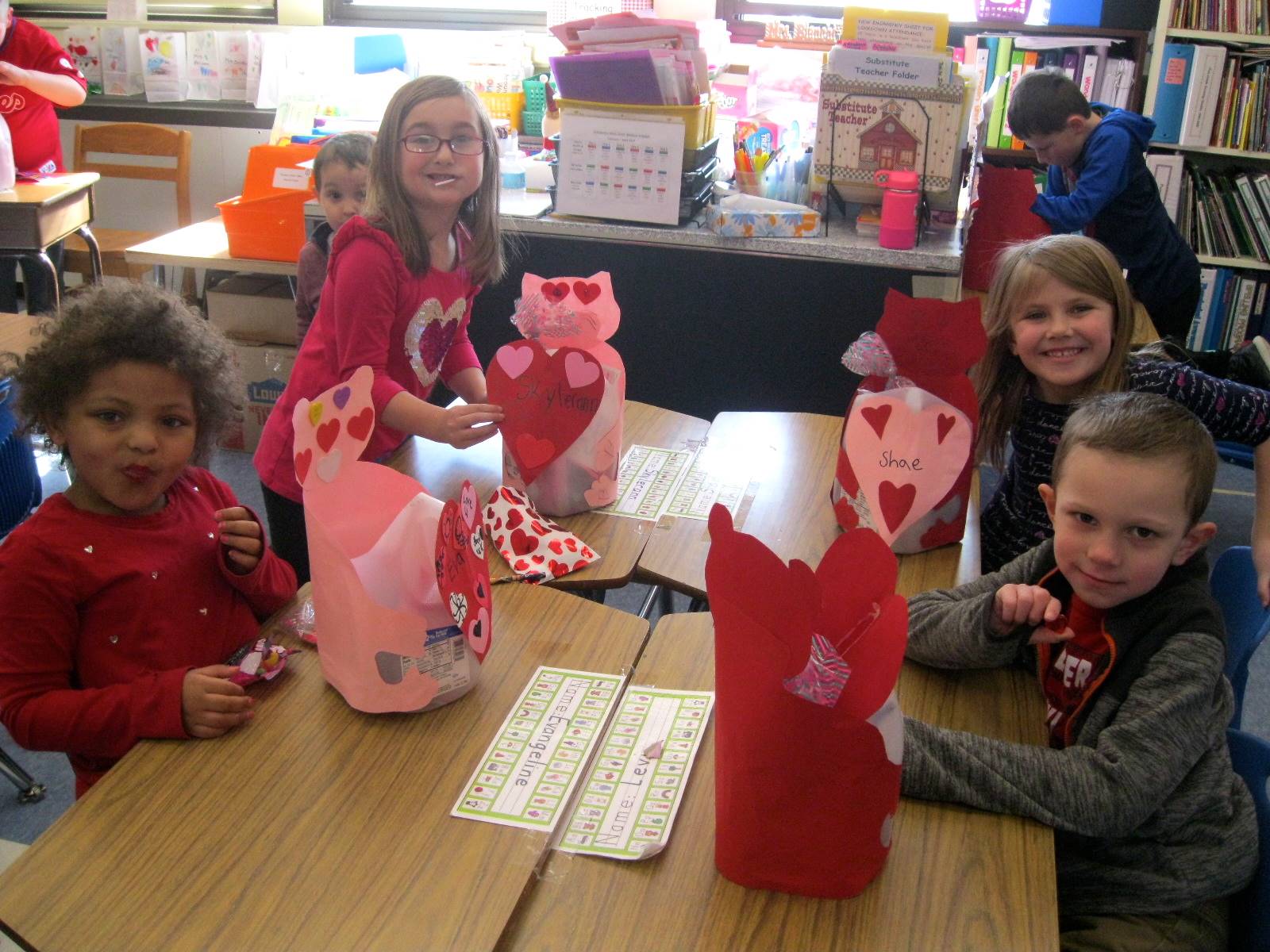 4 students with valentine's buckets!