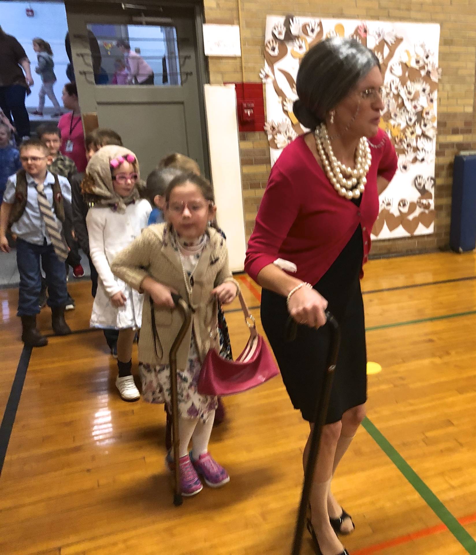 Teacher and students dressed up as 100 yr. olds.