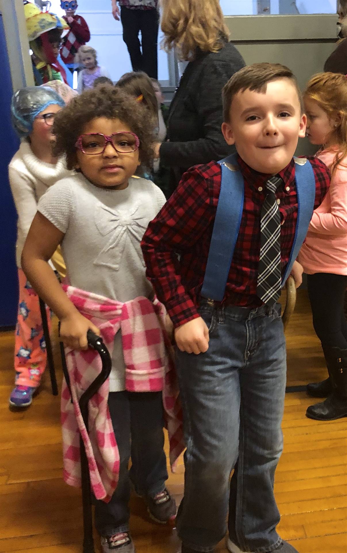 2 students dressed as 100 yr. olds. 