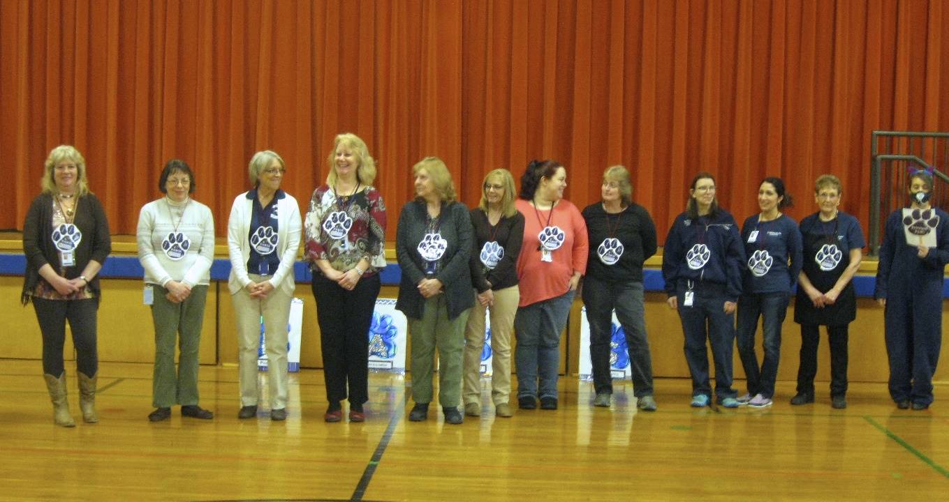 12 Support Staff are honored on 100th day of school.