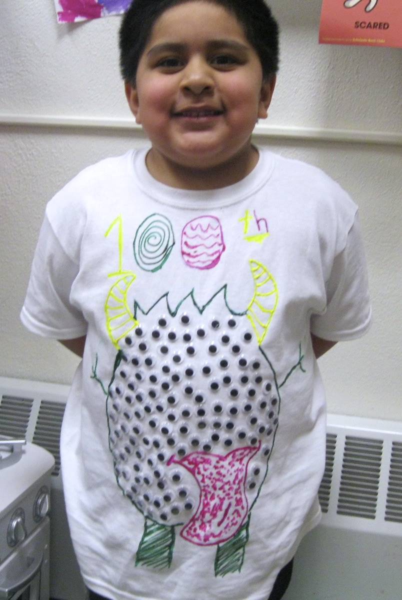 1 student with 100 dragon scales on a T-shirt.