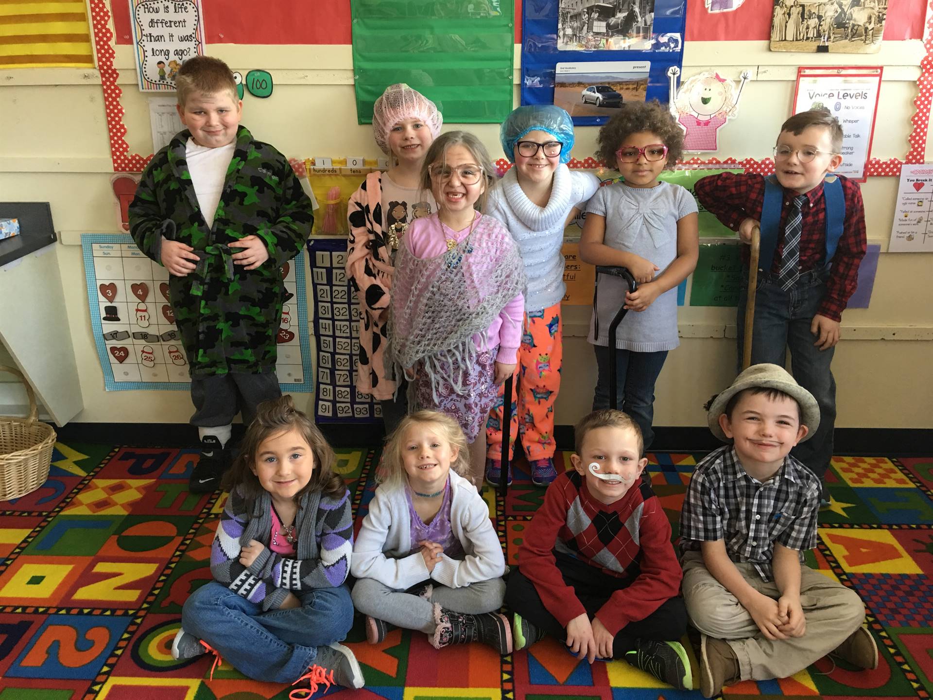 A first grade class dressed as 100 years old.