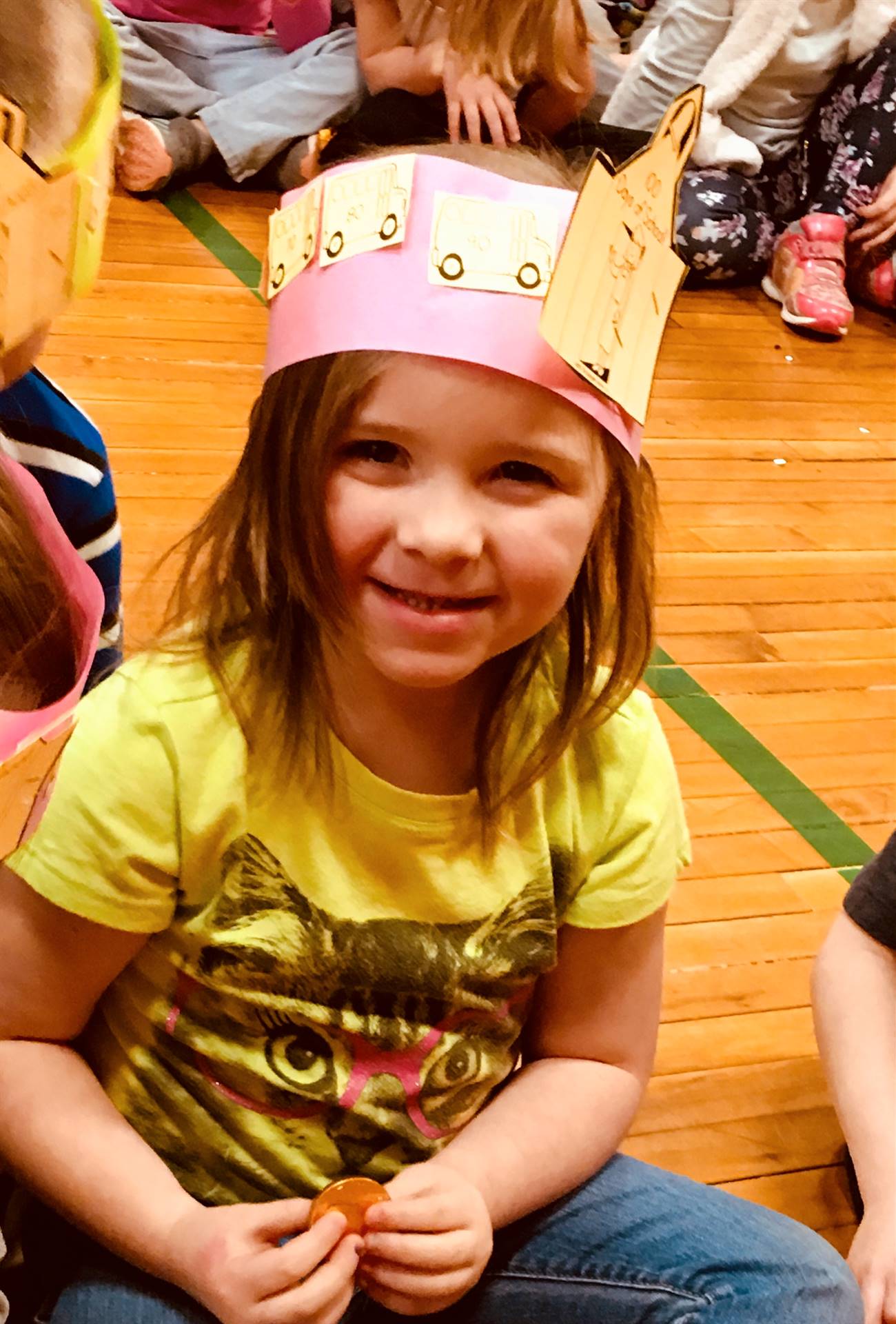 1 student with 100th day  hat.